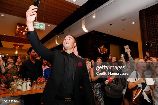 Grant Crapp takes a selfie with fans at the ManCave Barbershop Chatswood Chase Launch on July 19, 2018 in Sydney, Australia.