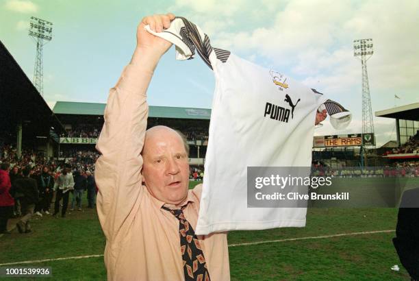 Derby County manager Jim Smith celebrates with a club shirt after Derby had acheived promotion to the Premiership after beating Crystal Palace at The...