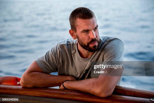 Spanish NBA basketball player Marc Gasol takes part in the rescue mission with the Spanish NGO Proactiva Open Arms on board of the Astral ship in the...