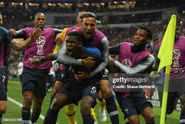 Paul Pogba of France celebrates with team mates after scoring during the 2018 FIFA World Cup Russia Final between France and Croatia at Luzhniki...