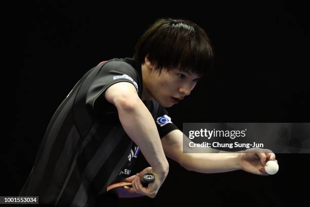 Kenta Matsudaira of Japan competes against Ham Yu-Song of North Korea in the Men's Single round of 32 on day one of the Shinhan Korea Open at Daejeon...