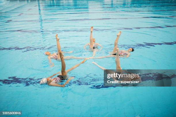 girls practicing - synchronized swimming stock pictures, royalty-free photos & images