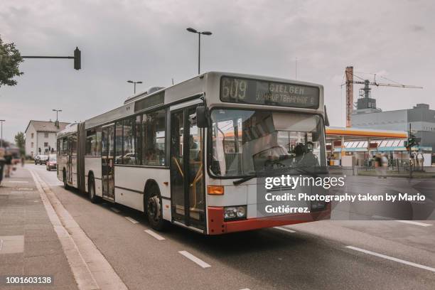 city bus - bus stock-fotos und bilder