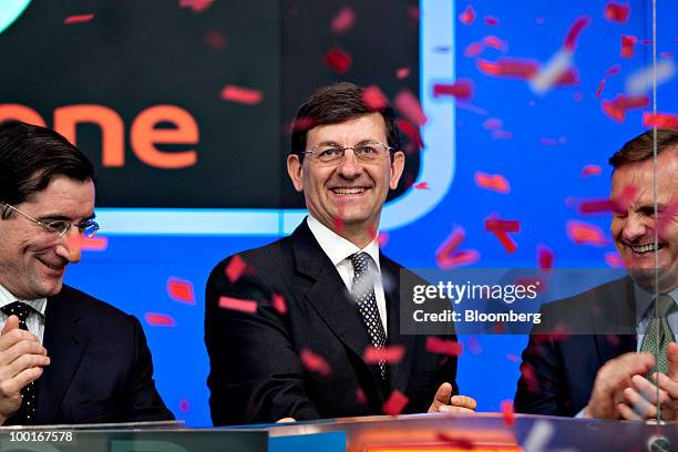 Vittorio Colao, chief executive officer of Vodafone Group Plc, participates in the opening bell ceremony with Robert Greifeld, chief executive...