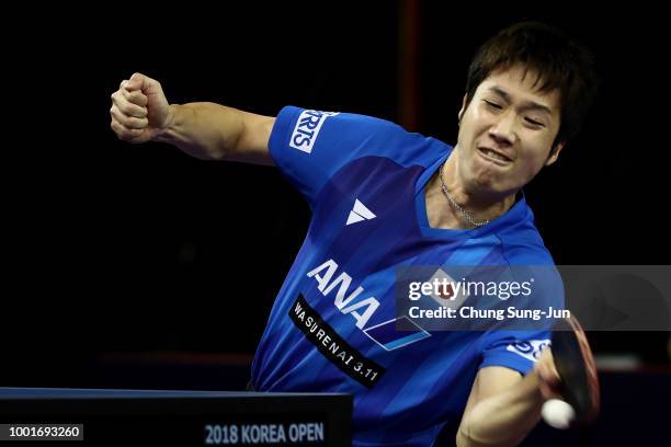 Jun Mizutani of Japan competes against Ning Gao of China in the Men's Single on day one of the Shinhan Korea Open at Daejeon Hanbat Stadium on July...