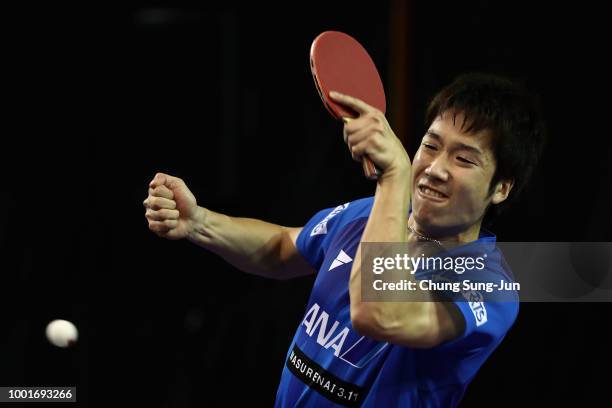 Jun Mizutani of Japan competes against Ning Gao of China in the Men's Single on day one of the Shinhan Korea Open at Daejeon Hanbat Stadium on July...