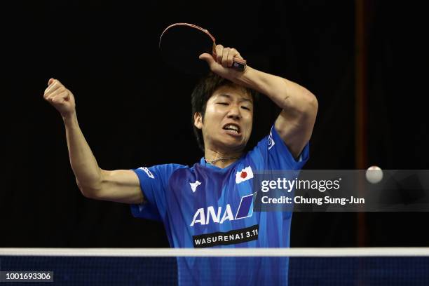 Jun Mizutani of Japan competes against Ning Gao of China in the Men's Single on day one of the Shinhan Korea Open at Daejeon Hanbat Stadium on July...