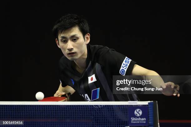 Jin Ueda of Japan competes against Yuya Oshima of Japan in the Men's Single on day one of the Shinhan Korea Open at Daejeon Hanbat Stadium on July...