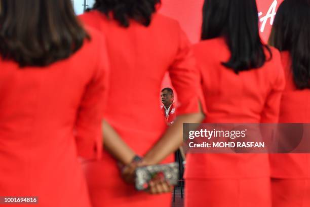 AirAsia boss Tony Fernandes speaks during a press conference in Sepang, on the outskirts of Kuala Lumpur on July 19, 2018. - Malaysian budget airline...