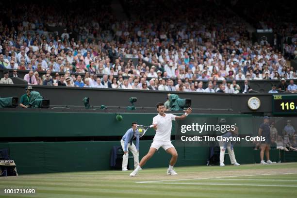 Novak Djokovic of Serbia in action against Rafael Nadal of Spain in the Men's Singles Semi-final on Center Court during the Wimbledon Lawn Tennis...