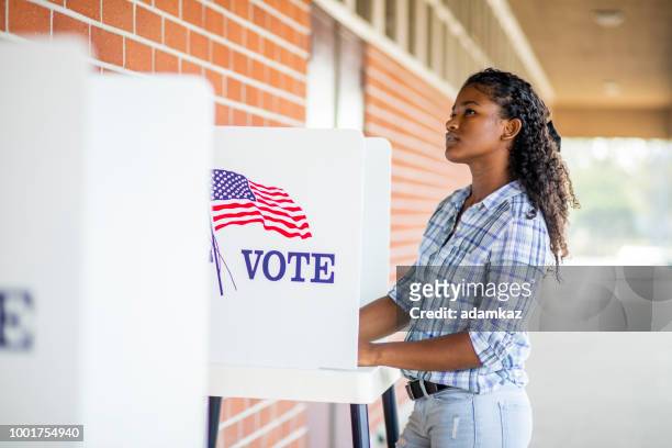 beautiful young black girl voting - student government stock pictures, royalty-free photos & images
