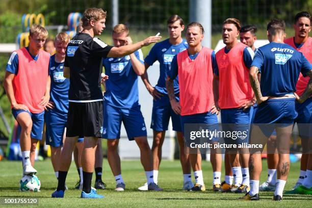 Hoffenheim's manager Julian Nagelsmann instructs his players at a training session in the Dietmar Hopp Sports Park in Zuzenhausen, Germany, 5 July...