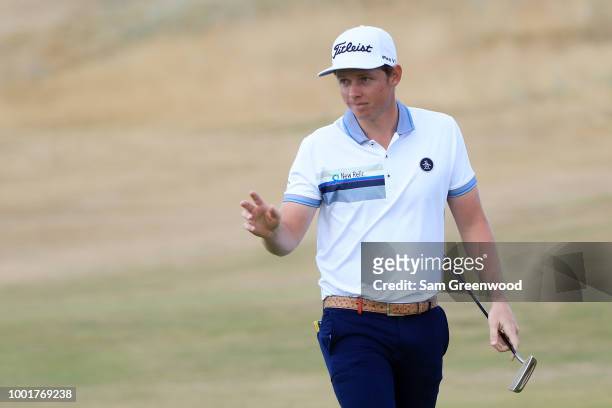 Cameron Smith of Australia acknowledges the crowd on the second green during the first round of the 147th Open Championship at Carnoustie Golf Club...