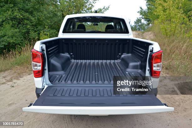 cargo bed in ssangyong pick-up truck - pick up truck stock pictures, royalty-free photos & images