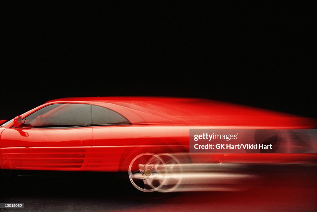 Red car (blurred motion)