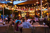 abstract blur image of night festival in a restaurant and The atmosphere is happy and relaxing