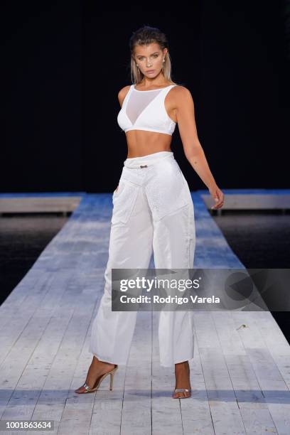 Model walks the runway for Aqua Blu during the Fashion Palette Miami Australian Swim Show SS19 at The Setai Miami Beach on July 15, 2018 in Miami...