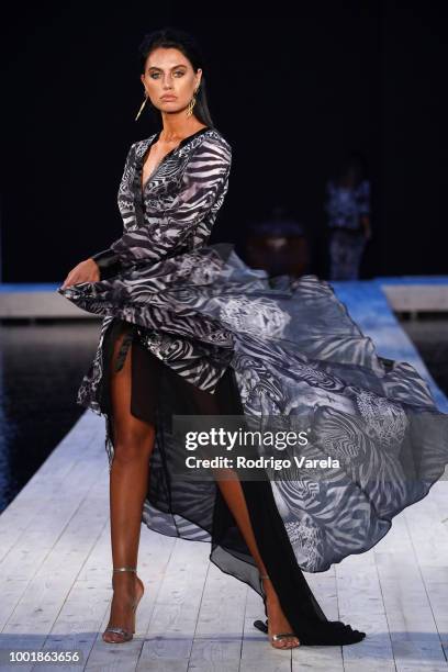 Model walks the runway for Aqua Blu during the Fashion Palette Miami Australian Swim Show SS19 at The Setai Miami Beach on July 15, 2018 in Miami...