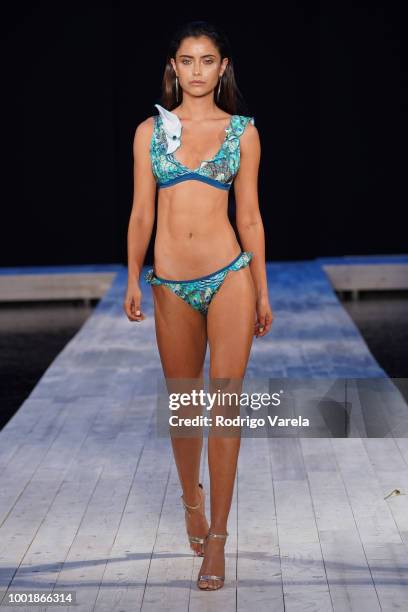 Model walks the runway for Aqua Blu during the Fashion Palette Miami Australian Swim Show SS19 at The Setai Miami Beach on July 15, 2018 in Miami...