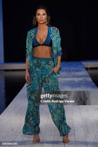 Model walks the runway for Aqua Blu during the Fashion Palette Miami Australian Swim Show SS19 at The Setai Miami Beach on July 15, 2018 in Miami...