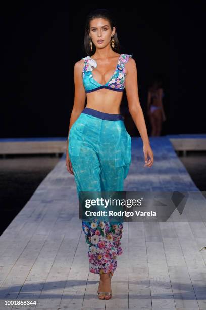 Model walks the runway for Aqua Blu during the Fashion Palette Miami Australian Swim Show SS19 at The Setai Miami Beach on July 15, 2018 in Miami...