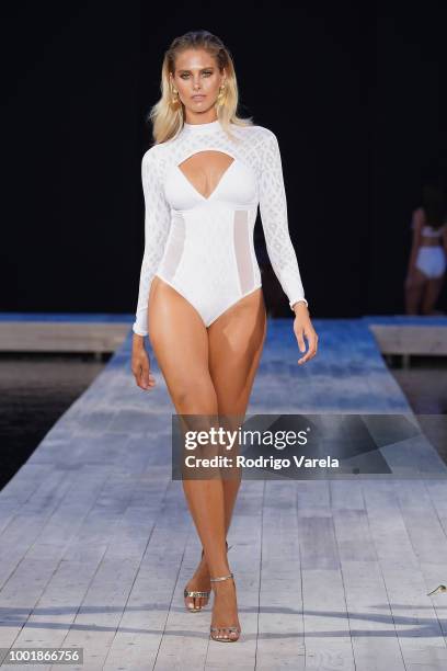 Model walks the runway for Aqua Blu during the Fashion Palette Miami Australian Swim Show SS19 at The Setai Miami Beach on July 15, 2018 in Miami...