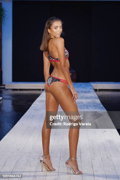 Model walks the runway for Aqua Blu during the Fashion Palette Miami Australian Swim Show SS19 at The Setai Miami Beach on July 15, 2018 in Miami...