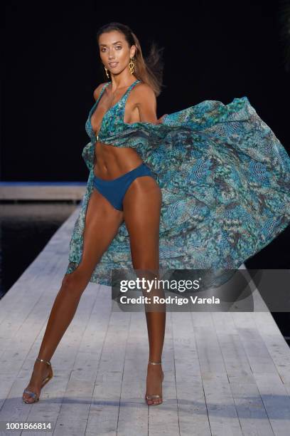 Model walks the runway for Aqua Blu during the Fashion Palette Miami Australian Swim Show SS19 at The Setai Miami Beach on July 15, 2018 in Miami...