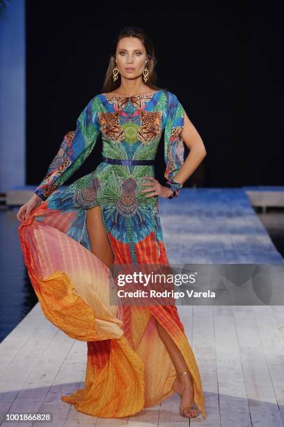 Model walks the runway for Aqua Blu during the Fashion Palette Miami Australian Swim Show SS19 at The Setai Miami Beach on July 15, 2018 in Miami...