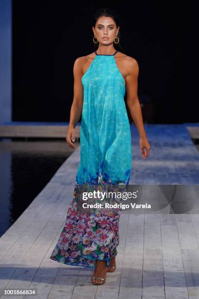 Model walks the runway for Aqua Blu during the Fashion Palette Miami Australian Swim Show SS19 at The Setai Miami Beach on July 15, 2018 in Miami...