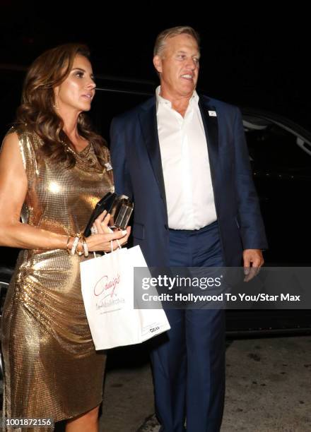 John Elway and Paige Green are seen on July 18, 2018 in Los Angeles, CA.