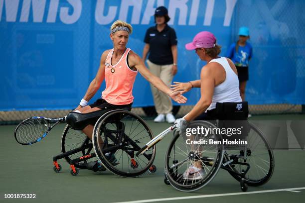 Charlotte Famin of France and Sabine Ellerbrock of Germany in action during her doubles semi final match against Lucy Shuker of Great Britain and...