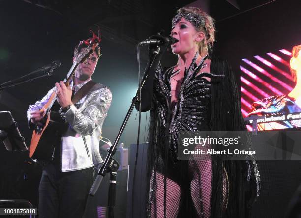 Musician Jake Edgley and actress Gigi Edgley perform at the Ready PARTY One SDCC Preview Night Party held at Fluxx on July 18, 2018 in San Diego,...