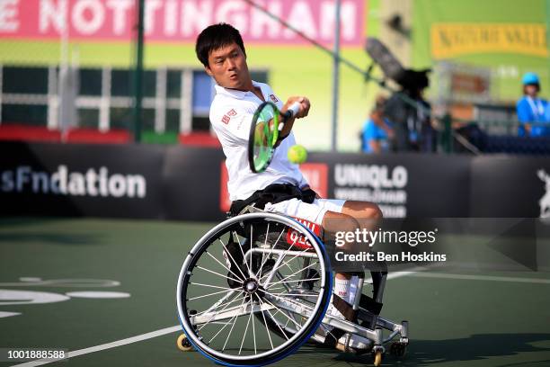 Shingo Kunieda of Japan plays a forehand during his doubles semi final against Alfie Hewett and Gordon Reid of Great Britain on day three of The...