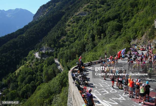 Geraint Thomas of Great Britain and Team Sky wearing the yellow jersey climbs up Alpe d'Huez on his way to victory during Stage 12, a 175.5km stage...