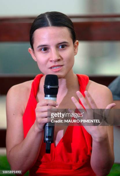 Brazilian actress Bianca Comparato speaks during a press conference after a shooting day of a new Brazilian movie on the collapse of the Pacifying...