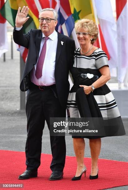 The President of the European Commission Jean-Claude Juncker and his wife Christiane Frising arrive for the concert at the Elbphilharmonie in...