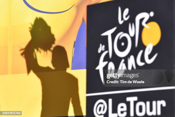 Podium / Geraint Thomas of Great Britain and Team Sky Yellow Leader Jersey / Celebration / Flowers / Shadow / Silhouet / TDF logo / during the 105th...