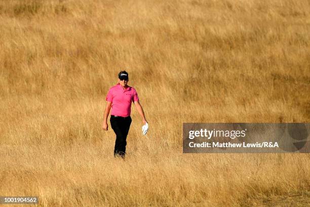 Ian Poulter of England walks down the 17th hole during round one of the 147th Open Championship at Carnoustie Golf Club on July 19, 2018 in...