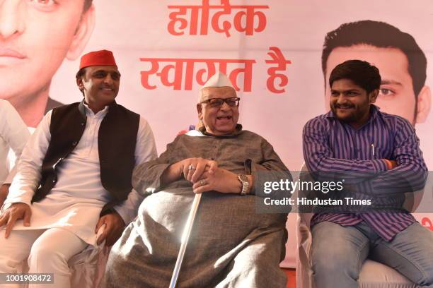 Samajwadi Party president Akhilesh Yadav and Patidar Anamat Andolan Samiti leader Hardik Patel and former UP Governor Aziz Qureshi during a meeting...