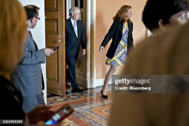 Senate Majority Leader Mitch McConnell, a Republican from Kentucky, center, walks out of a meeting at the U.S. Capitol in Washington, D.C., U.S., on...