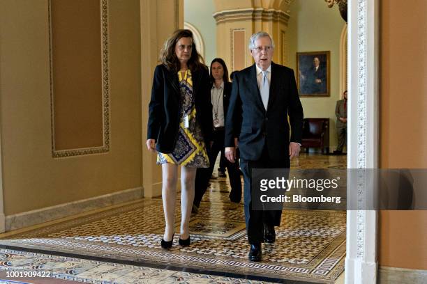 Senate Majority Leader Mitch McConnell, a Republican from Kentucky, right, walks to a meeting at the U.S. Capitol in Washington, D.C., U.S., on...
