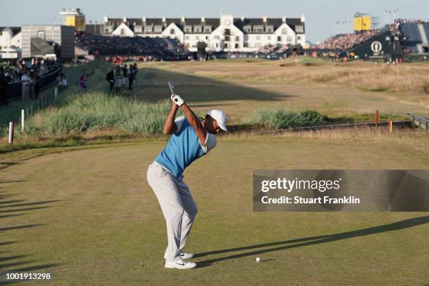 Tiger Woods of the United States plays his shot from the 18th tee during the first round of the 147th Open Championship at Carnoustie Golf Club on...