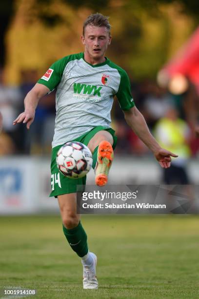 Georg Teigl of Augsburg plays the ball during the pre-season friendly match between SC Olching and FC Augsburg on July 19, 2018 in Olching, Germany.