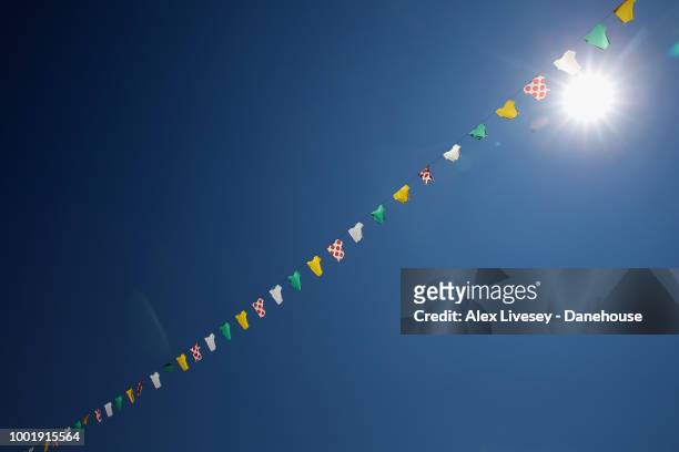 Flags are seen prioe to Stage 12, a 175.5km stage from Bourg-Saint-Maurice Les Arcs to Alpe d'Huez, of the 105th Tour de France 2018, on July 19,...