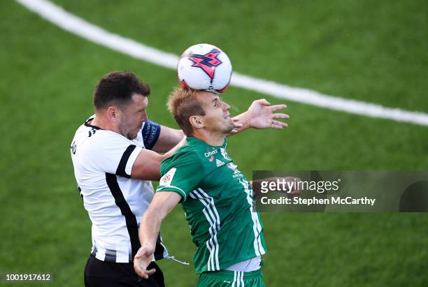 Dundalk , Ireland - 19 July 2018; Nikita Andreev of Levadia in action against Brian Gartland of Dundalk during the UEFA Europa League 1st Qualifying...