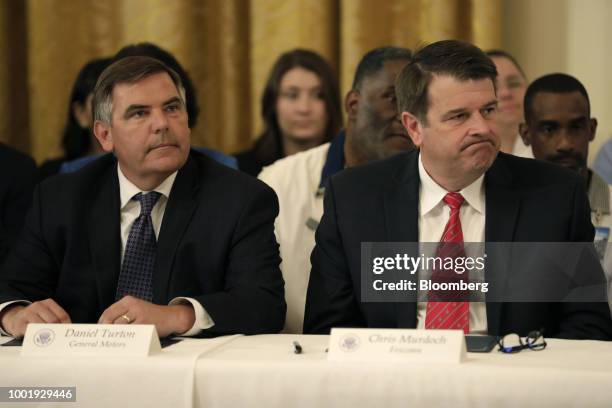 Daniel Turton, vice president of federal & administration affairs for General Motors Co., left, and Chris Murdoch, senior advisor for Foxconn...