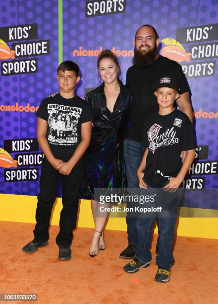 Wrestler Ronda Rousey and mixed martial artist Travis Browne attend the Nickelodeon Kids' Choice Sports 2018 at Barker Hangar on July 19, 2018 in...