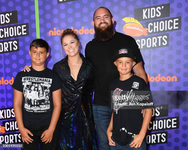 Wrestler Ronda Rousey and mixed martial artist Travis Browne attend the Nickelodeon Kids' Choice Sports 2018 at Barker Hangar on July 19, 2018 in...