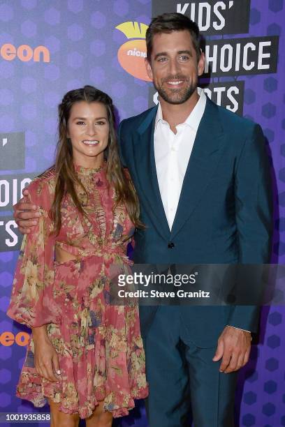 Honoree Danica Patrick and NFL player Aaron Rodgers attend the Nickelodeon Kids' Choice Sports 2018 at Barker Hangar on July 19, 2018 in Santa...